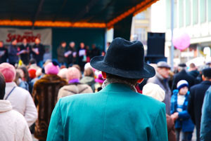 Elderly man enjoying a singing choir